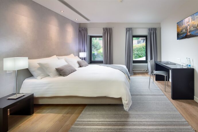 Imagen de la habitación del Hotel La Ferme du Ch&acirc;teau. Foto 15