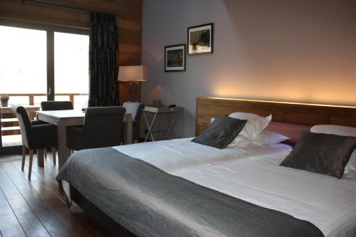 Imagen de la habitación del Hotel La Ferronniere. Foto 14