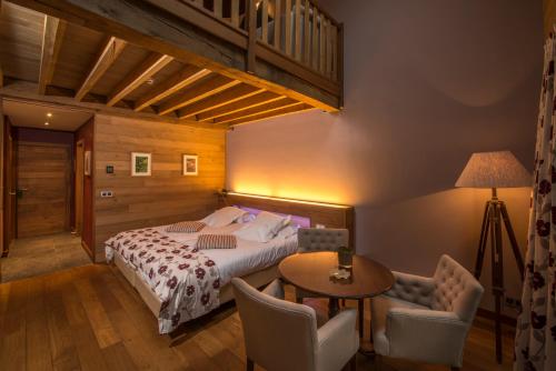Imagen de la habitación del Hotel La Ferronniere. Foto 17