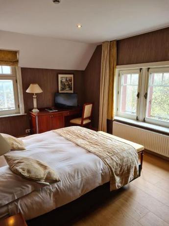 Imagen de la habitación del Hotel La Ferronniere. Foto 18