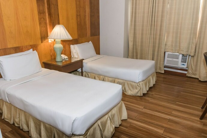 Imagen de la habitación del Hotel La Fiesta. Foto 13