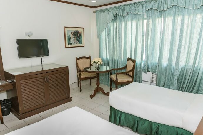 Imagen de la habitación del Hotel La Fiesta. Foto 16
