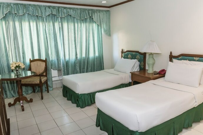 Imagen de la habitación del Hotel La Fiesta. Foto 22