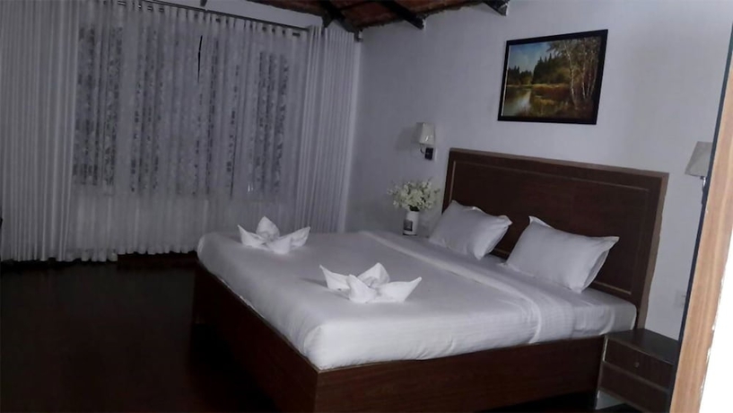 Imagen de la habitación del Hotel La Flora Beverly Hill Resort. Foto 7