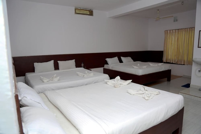 Imagen de la habitación del Hotel La Flora Beverly Hill Resort. Foto 9