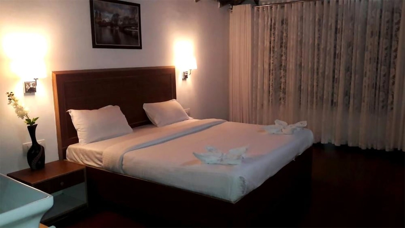 Imagen de la habitación del Hotel La Flora Beverly Hill Resort. Foto 11