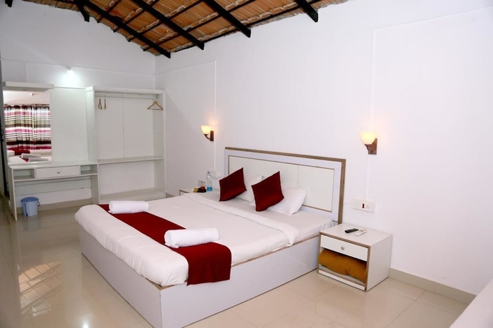 Imagen de la habitación del Hotel La Flora Beverly Hill Resort. Foto 12