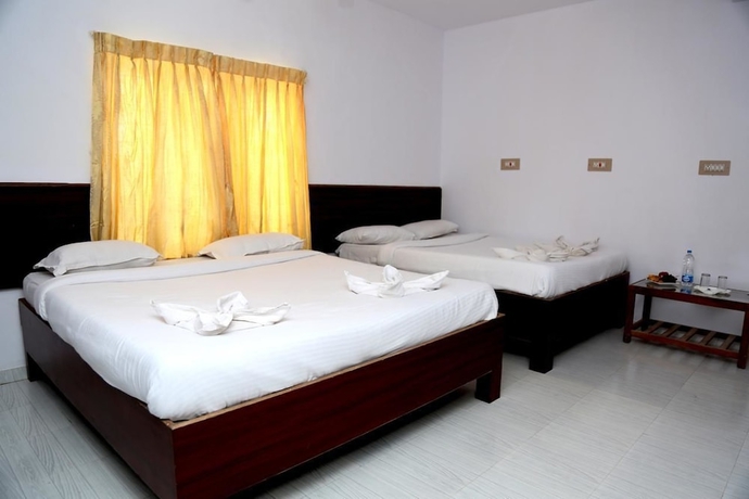 Imagen de la habitación del Hotel La Flora Beverly Hill Resort. Foto 14