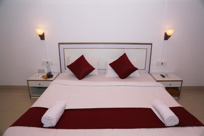 Imagen de la habitación del Hotel La Flora Beverly Hill Resort. Foto 15