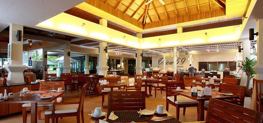 Imagen del bar/restaurante del Hotel La Flora Khao Lak - Sha Extra Plus. Foto 2