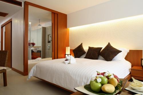 Imagen de la habitación del Hotel La Flora Resort Patong - Sha Extra Plus. Foto 13