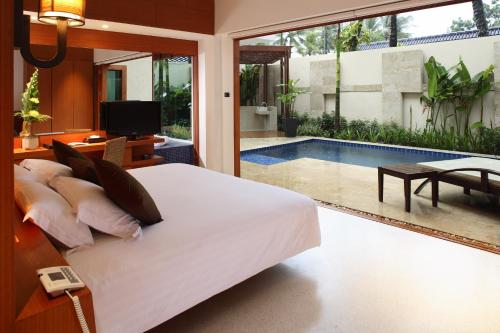 Imagen de la habitación del Hotel La Flora Resort Patong - Sha Extra Plus. Foto 15