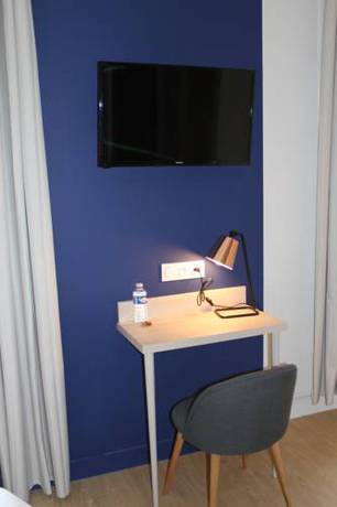 Imagen de la habitación del Hotel La Fontaine Caen Centre. Foto 3