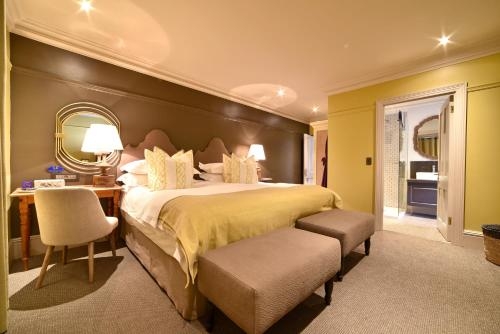 Imagen de la habitación del Hotel La Fontaine Guest House. Foto 6