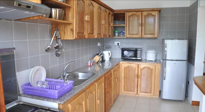 Imagen de la habitación del Hotel La Fontaine Holiday Apartments. Foto 16