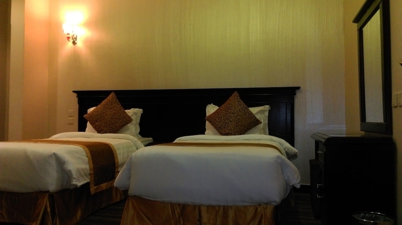 Imagen de la habitación del Hotel La Fontaine Sarat Abha Hotel. Foto 5