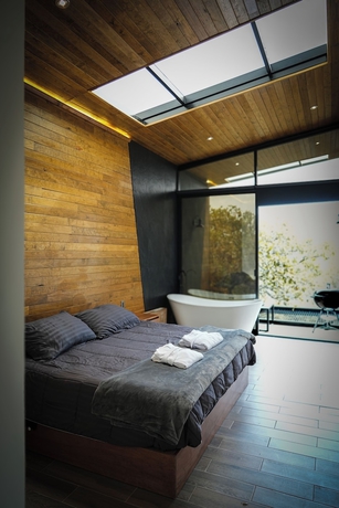Imagen de la habitación del Hotel La For&ecirc;t Caba&ntilde;as Boutique. Foto 9