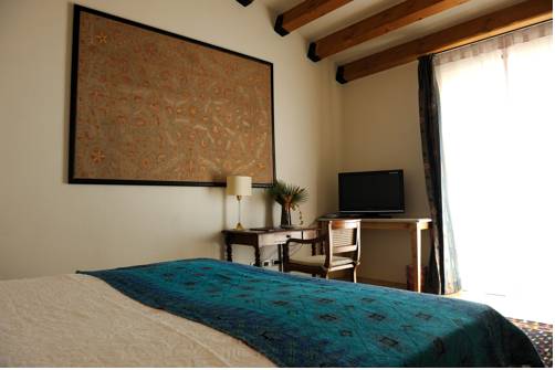 Imagen de la habitación del Hotel La Foresteria Planeta Estate. Foto 7