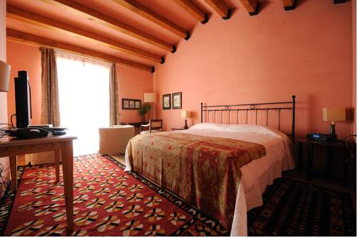 Imagen de la habitación del Hotel La Foresteria Planeta Estate. Foto 8