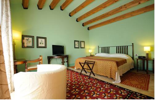 Imagen de la habitación del Hotel La Foresteria Planeta Estate. Foto 9