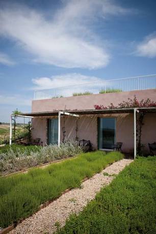 Imagen de la habitación del Hotel La Foresteria Planeta Estate. Foto 11