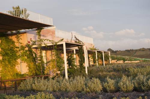 Imagen de la habitación del Hotel La Foresteria Planeta Estate. Foto 13