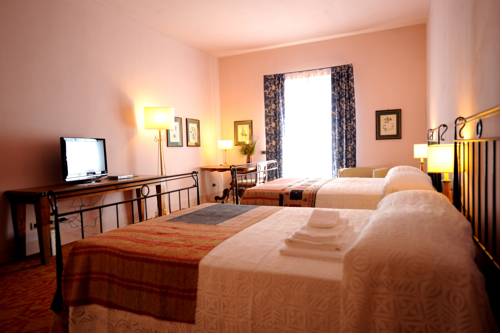 Imagen de la habitación del Hotel La Foresteria Planeta Estate. Foto 14