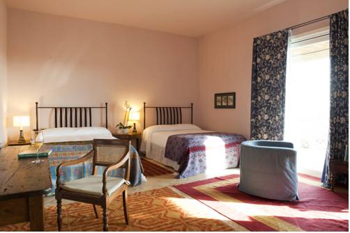 Imagen de la habitación del Hotel La Foresteria Planeta Estate. Foto 15