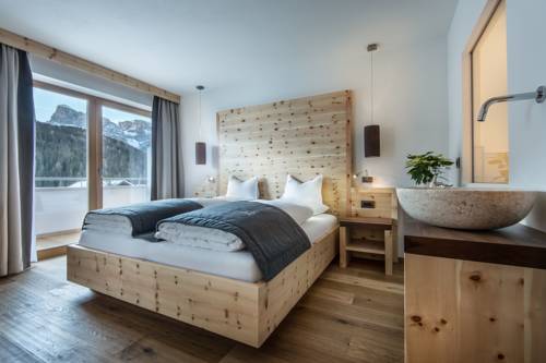 Imagen de la habitación del Hotel La Fradora - Dolomites. Foto 2