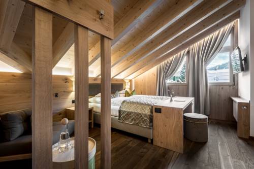 Imagen de la habitación del Hotel La Fradora - Dolomites. Foto 4