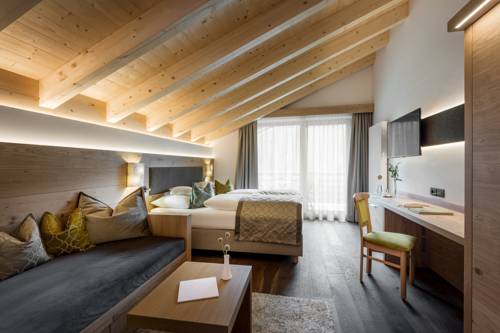 Imagen de la habitación del Hotel La Fradora - Dolomites. Foto 5