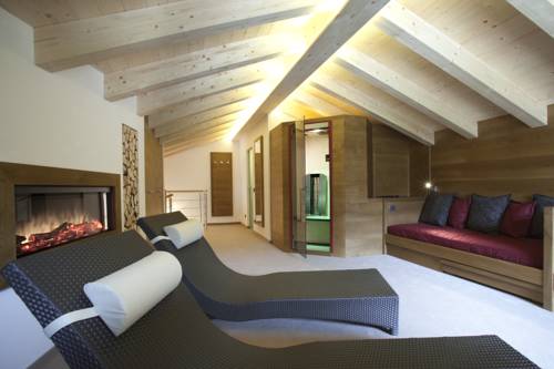 Imagen de la habitación del Hotel La Fradora - Dolomites. Foto 10