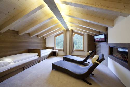 Imagen de la habitación del Hotel La Fradora - Dolomites. Foto 11