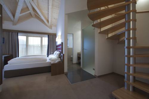 Imagen de la habitación del Hotel La Fradora - Dolomites. Foto 12