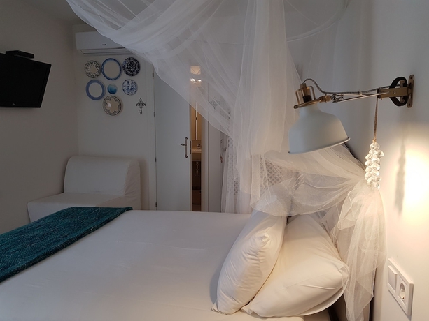 Imagen de la habitación del Hotel La Francesa Suites. Foto 18