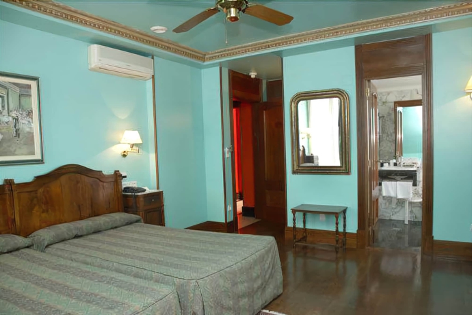 Imagen de la habitación del Hotel La Galería. Foto 7