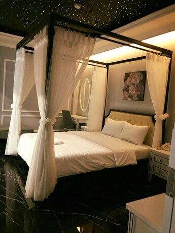 Imagen de la habitación del Hotel La Galerie Hotel. Foto 3