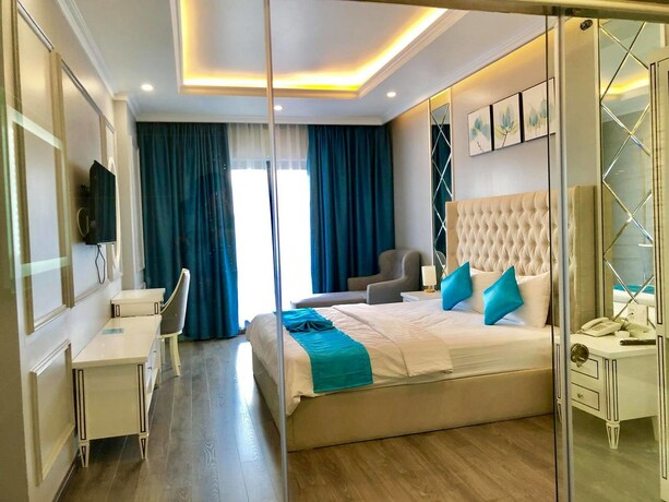 Imagen de la habitación del Hotel La Galerie Hotel. Foto 6