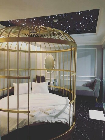 Imagen de la habitación del Hotel La Galerie Hotel. Foto 8