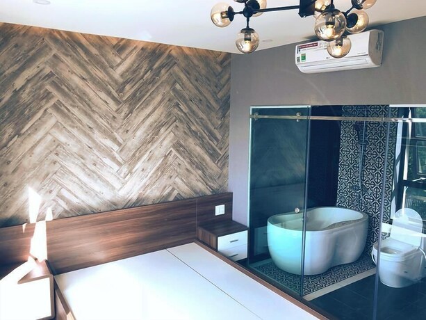 Imagen de la habitación del Hotel La Galerie Hotel. Foto 11