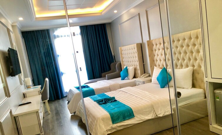 Imagen de la habitación del Hotel La Galerie Hotel. Foto 14