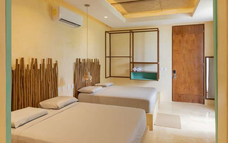 Imagen de la habitación del Hotel La Galuna Bacalar. Foto 17