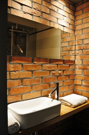 Imagen de la habitación del Hotel La Gioia Designers Lofts Luxury Apartments. Foto 7