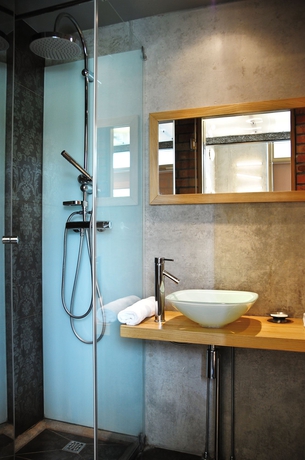 Imagen de la habitación del Hotel La Gioia Designers Lofts Luxury Apartments. Foto 8