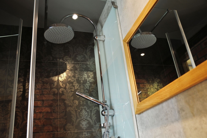 Imagen de la habitación del Hotel La Gioia Designers Lofts Luxury Apartments. Foto 9