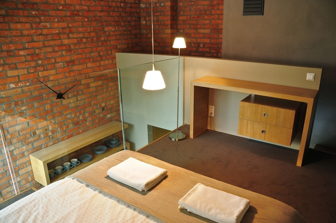 Imagen de la habitación del Hotel La Gioia Designers Lofts Luxury Apartments. Foto 10