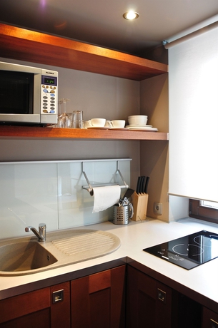 Imagen de la habitación del Hotel La Gioia Modern Designed Studios. Foto 4