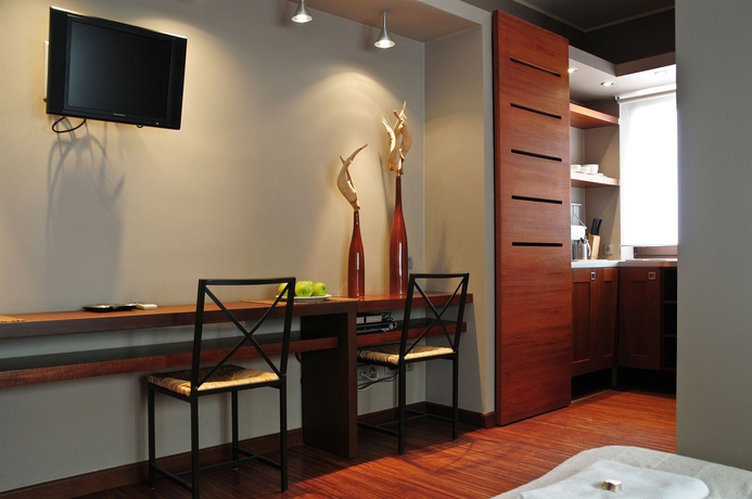 Imagen de la habitación del Hotel La Gioia Modern Designed Studios. Foto 7