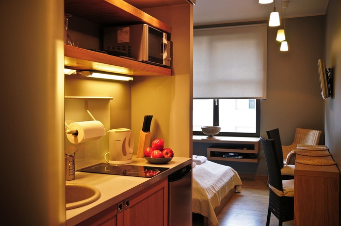 Imagen de la habitación del Hotel La Gioia Modern Designed Studios. Foto 12