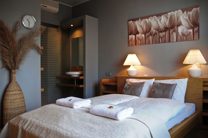 Imagen de la habitación del Hotel La Gioia Modern Designed Studios. Foto 13